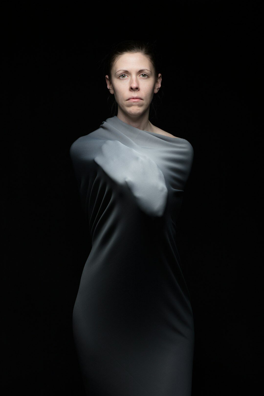 Studio portrait of a Finnish woman in her forties with short hair