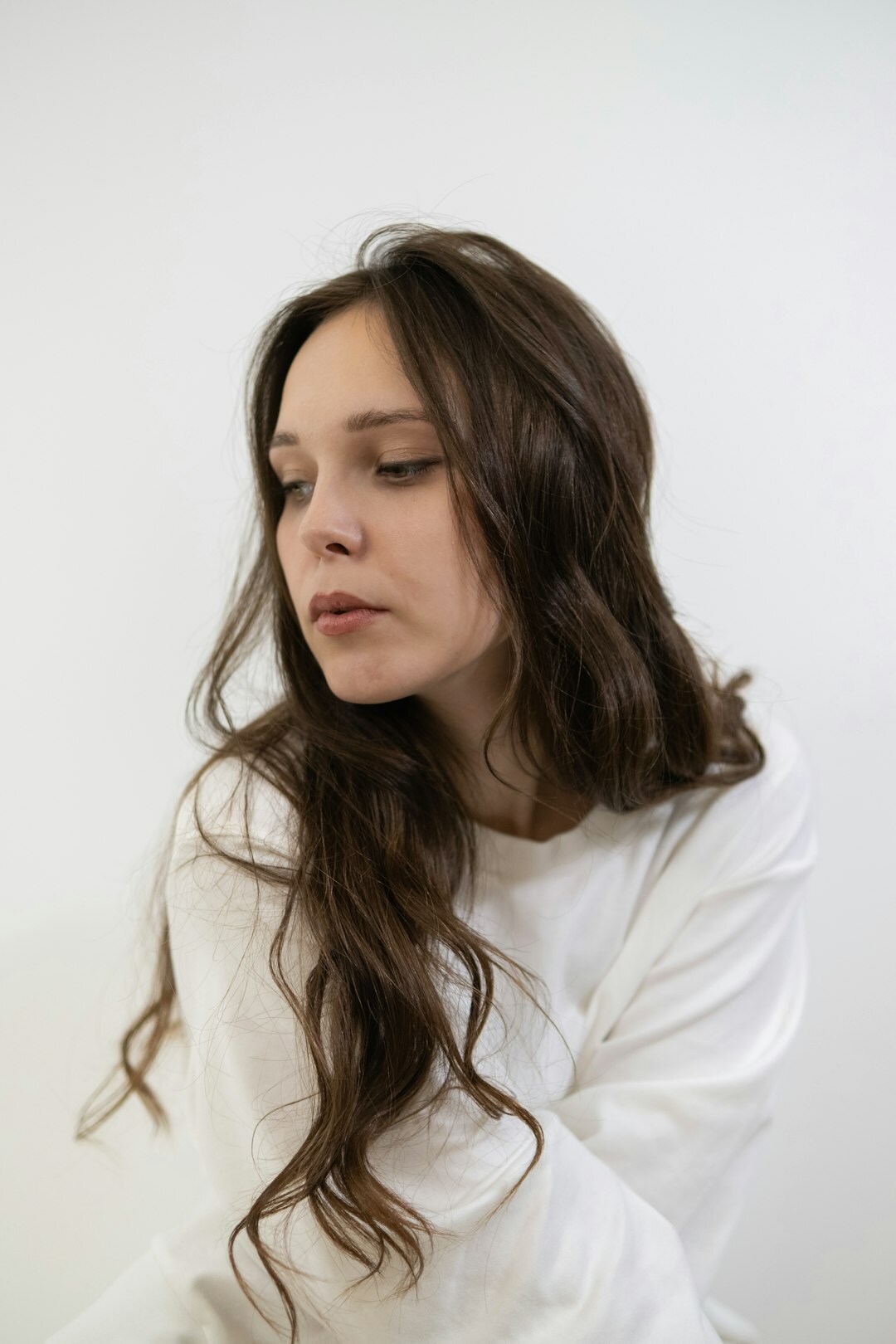 Studio portrait of a Finnish woman in her twenties with long hair